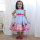Girl's blue dress with cupcake, cakes and candy, birthday party