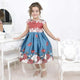 Girl's blue floral dress with red and bow embroidered in pearls, formal party