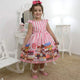 Girl's confectionery dress with cupcake, cakes and candy, birthday party