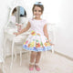 Girl's dress from fruits, bees and ice cream, children party