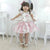 Girl’s floral dress with pink tulle on the skirt + Hair Bow - Dress